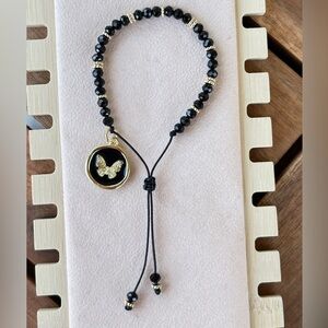 Black Beaded Bracelet with Gold Butterfly Charm